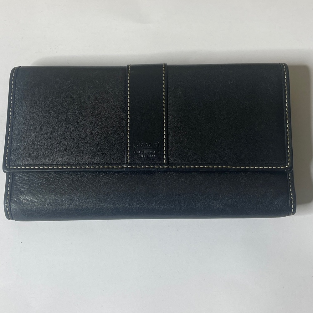 This is a Coach Hampton black leather trifold wallet